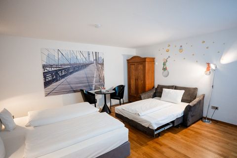Family Room at Hotel am Main themed around Antoine de Saint-Exupéry